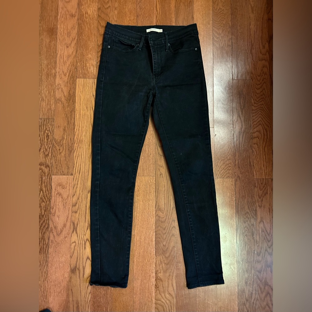Levi Strauss women’s size 28” waist black slimming skinny jeans
